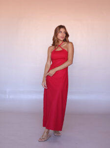 Front view of the Soleil Halter Linen Blend Maxi Dress styled with flat sandals for a resort look.