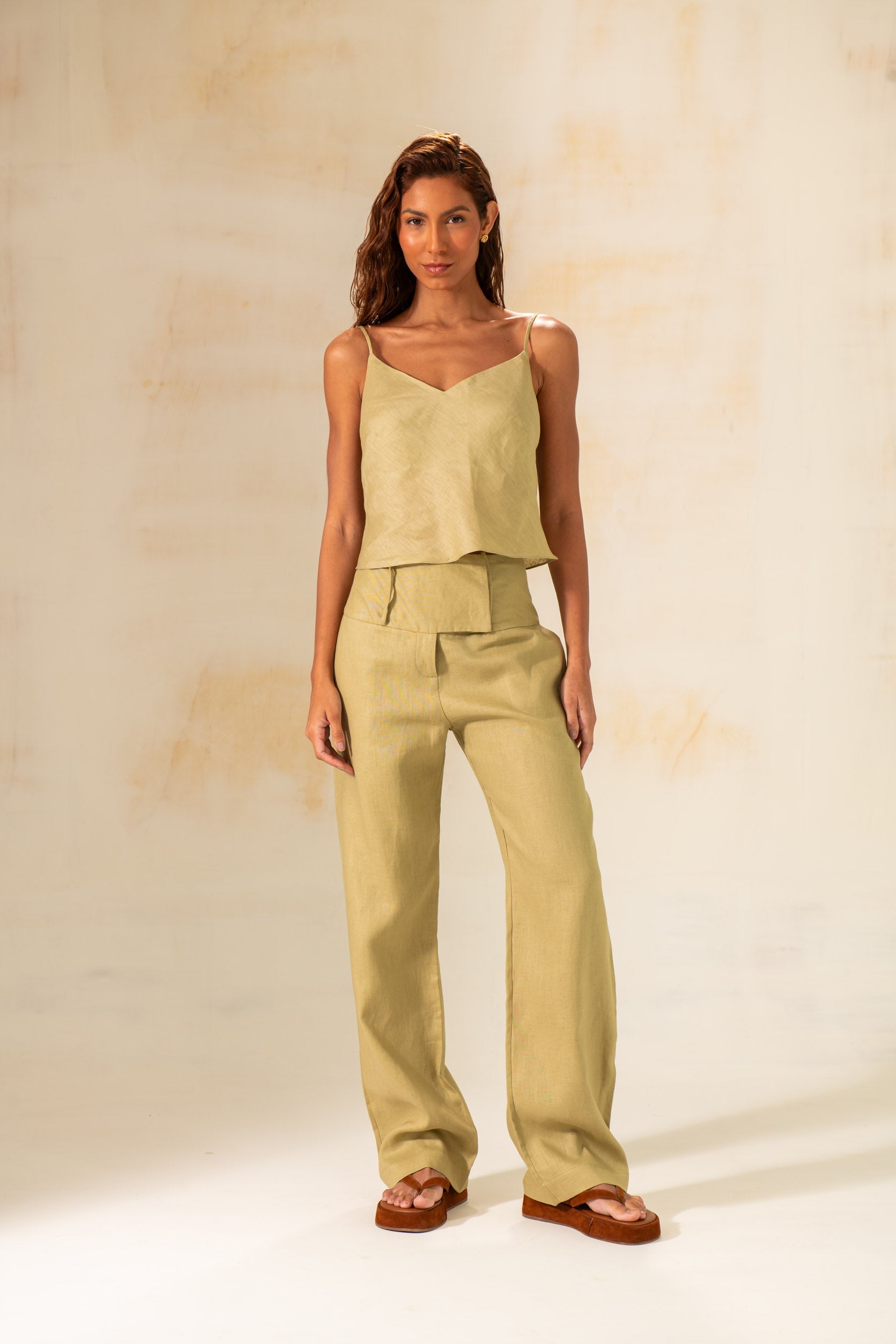 Close-up of linen fabric and waistband detail on summer pants