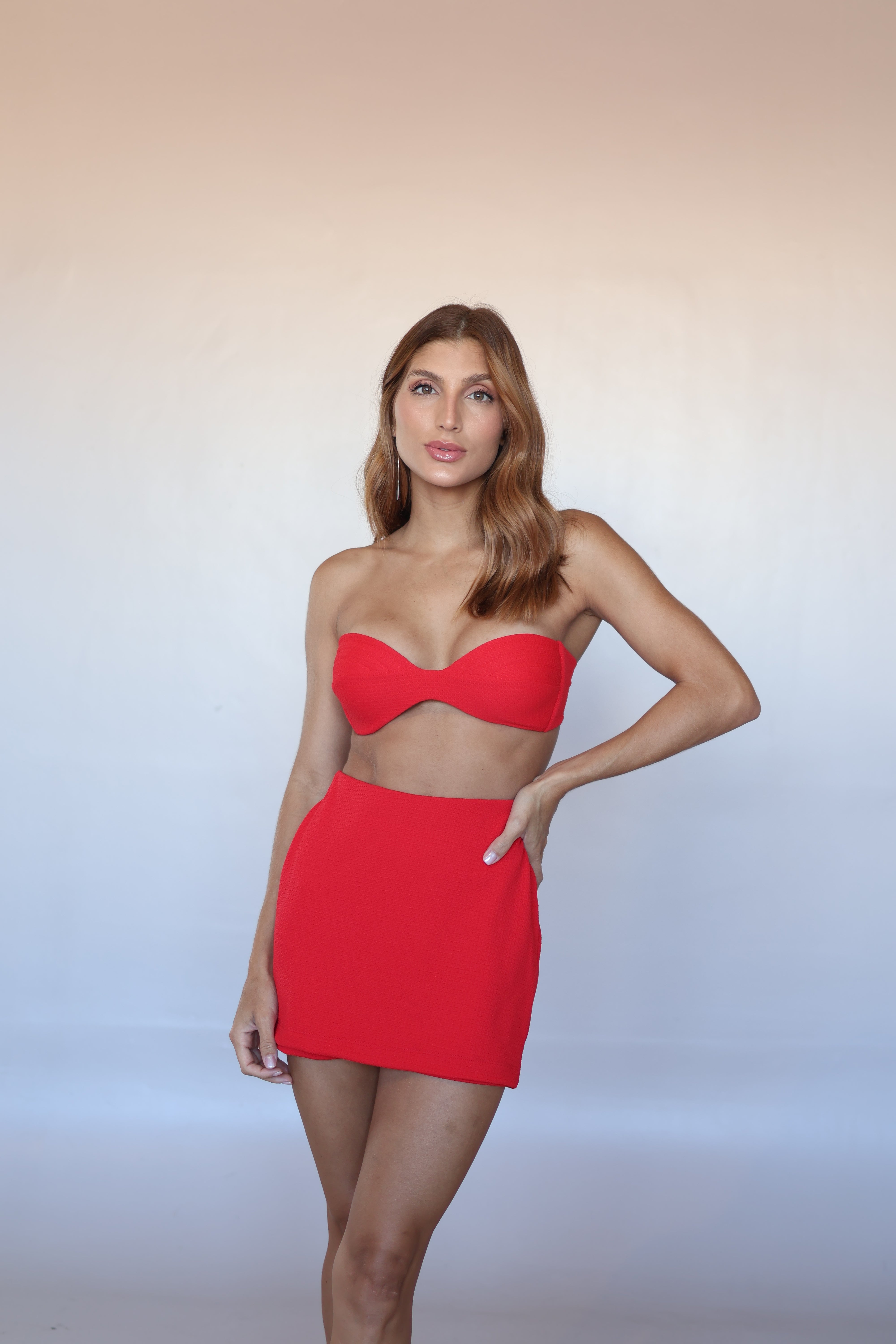 Sienna Textured Skort in Scarlet Red styled with the matching bikini top.