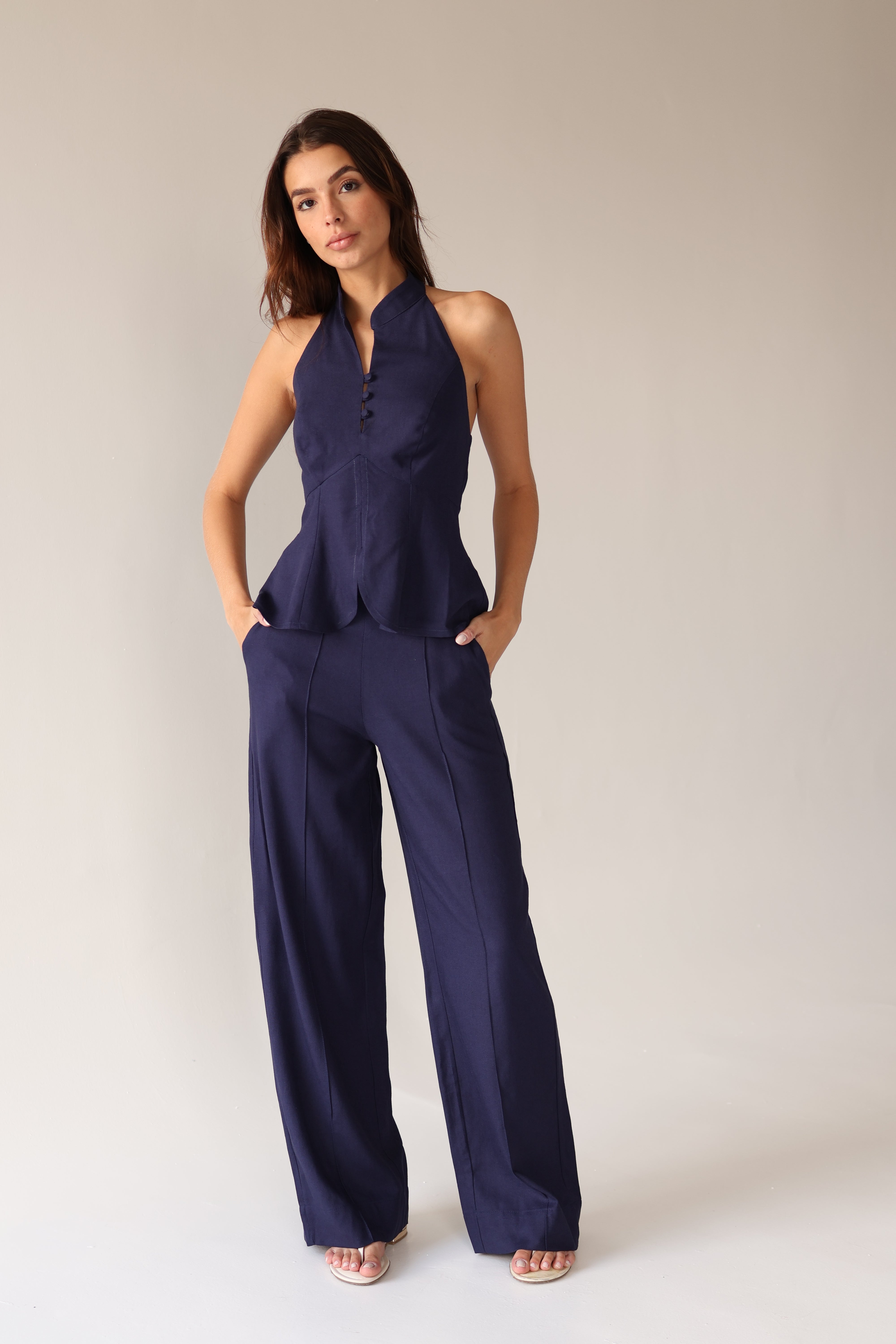 Navy linen halter peplum top and wide-leg trouser set — Brazilian resort wear by Amazônia Beachwear, front view
