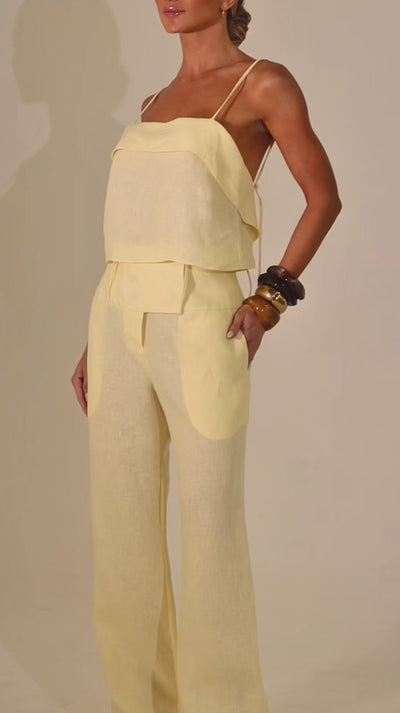 High-waist linen pants with lightweight feel and elegant movement.